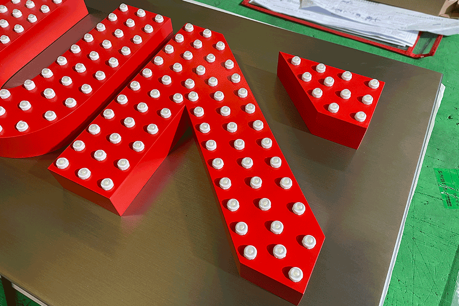 麻豆视频APPIOS冲孔字发光标识的过程有哪些？